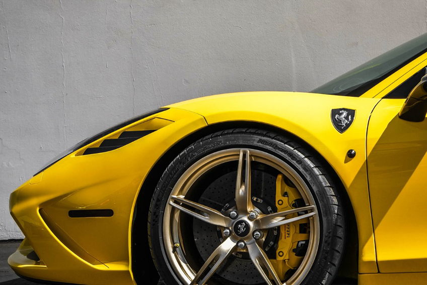 luxury_repair Car detailing - the man holds the microfiber in hand and polishes the car